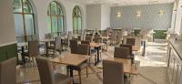 Un restaurante u otro lugar para comer en Manor Of Groves Hotel, Golf & Health Club
