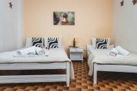 Posteľ alebo postele v izbe v ubytovaní Rooms Maria