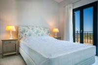 Postel nebo postele na pokoji v ubytování Seirios Luxury Villa