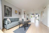 Posezení v ubytování Beach Apartment by Nestico