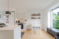 Kuchyň nebo kuchyňský kout v ubytování Beach Apartment by Nestico