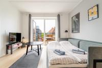 TV a/nebo společenská místnost v ubytování Beach Apartment by Nestico