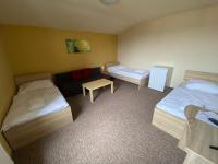 Postel nebo postele na pokoji v ubytování Valnovka Wellness Hotel