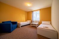 Postel nebo postele na pokoji v ubytování Valnovka Wellness Hotel