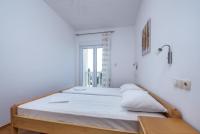 Posteľ alebo postele v izbe v ubytovaní Apartment in Duce with sea view, terrace, air conditioning, WiFi 3423-3