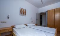 Posteľ alebo postele v izbe v ubytovaní Apartment in Duce with sea view, terrace, air conditioning, WiFi 3423-3