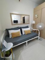 Condo by Bambie near NAIA airportにあるベッド