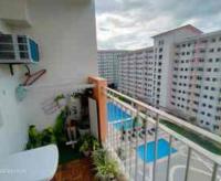 Condo by Bambie near NAIA airportにあるバルコニーまたはテラス