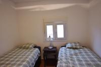 Posteľ alebo postele v izbe v ubytovaní Apartament Casa Levante