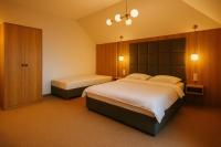 Posteľ alebo postele v izbe v ubytovaní Resort EDEN domki, apartamenty i pokoje