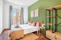 Postel nebo postele na pokoji v ubytování Big apartment for 15 in the heart of Eixample