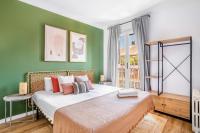 Postel nebo postele na pokoji v ubytování Big apartment for 15 in the heart of Eixample