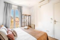 Postel nebo postele na pokoji v ubytování Big apartment for 15 in the heart of Eixample