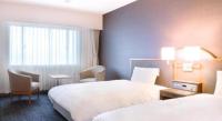 Imazu Sun Bridge Hotelにあるベッド