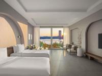 Ein Bett oder Betten in einem Zimmer der Unterkunft Rixos The Palm Hotel &amp; Suites - Ultra All Inclusive