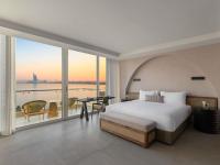 Ein Bett oder Betten in einem Zimmer der Unterkunft Rixos The Palm Hotel &amp; Suites - Ultra All Inclusive