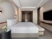 Ein Bett oder Betten in einem Zimmer der Unterkunft Rixos The Palm Hotel &amp; Suites - Ultra All Inclusive