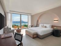 Ein Bett oder Betten in einem Zimmer der Unterkunft Rixos The Palm Hotel &amp; Suites - Ultra All Inclusive