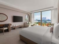 Ein Bett oder Betten in einem Zimmer der Unterkunft Rixos The Palm Hotel &amp; Suites - Ultra All Inclusive