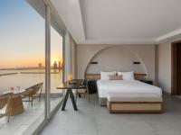 Ein Bett oder Betten in einem Zimmer der Unterkunft Rixos The Palm Hotel &amp; Suites - Ultra All Inclusive