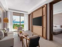 Ein Bett oder Betten in einem Zimmer der Unterkunft Rixos The Palm Hotel &amp; Suites - Ultra All Inclusive