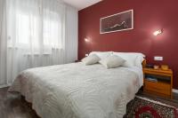 Postel nebo postele na pokoji v ubytování Apartments Mauri