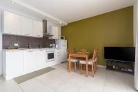Kuchyň nebo kuchyňský kout v ubytování Apartments Mauri