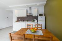 Kuchyň nebo kuchyňský kout v ubytování Apartments Mauri