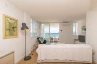 Postel nebo postele na pokoji v ubytování Beachfront Apartment Sivella by Sealand Villas