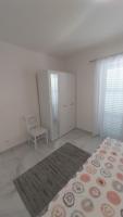 Posteľ alebo postele v izbe v ubytovaní Apartmani Miletić