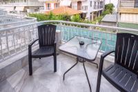 A balcony or terrace at Carpe Diem Rooms Nei Pori