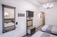 A bed or beds in a room at Carpe Diem Rooms Nei Pori