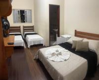 Hotel Chão Mineiroにあるベッド
