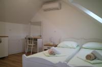 Postel nebo postele na pokoji v ubytování Studio Apartments & Rooms Lela, Sipan island