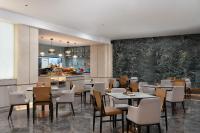 En restaurant eller et andet spisested på Wanda Yue Hotel Tangshan North Station