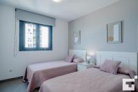 Postel nebo postele na pokoji v ubytování Apartamento Bernia al Mar 8B - Grupo Turis