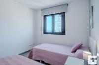 Postel nebo postele na pokoji v ubytování Apartamento Bernia al Mar 8B - Grupo Turis