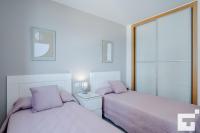 Postel nebo postele na pokoji v ubytování Apartamento Bernia al Mar 8B - Grupo Turis