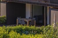 A garden outside Krone Apartments Schruns, Top 6/7/8