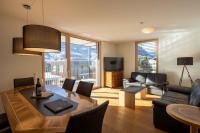 A seating area at Krone Apartments Schruns, Top 6/7/8