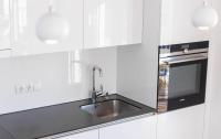 A kitchen or kitchenette at Krone Apartments Schruns, Top 6/7/8