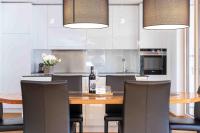 A kitchen or kitchenette at Krone Apartments Schruns, Top 6/7/8