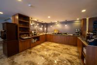 Køkken eller tekøkken på Coastline Orange Hotel