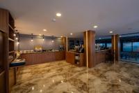 Køkken eller tekøkken på Coastline Orange Hotel