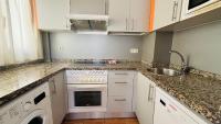 A kitchen or kitchenette at Holiday Apartment Casa Vista Mar Oliastur El Cotillo