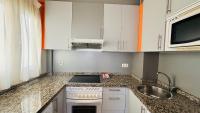 A kitchen or kitchenette at Holiday Apartment Casa Vista Mar Oliastur El Cotillo