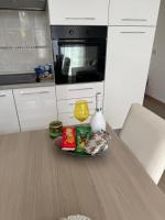 A kitchen or kitchenette at Le bougainvillea 2