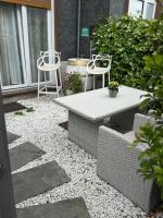 A patio or other outdoor area at Le bougainvillea 2