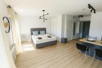 Posteľ alebo postele v izbe v ubytovaní Kayak Apartment