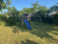 Detský kútik v ubytovaní Villa Family Surf sur un terrain arborée et clos, calme et repos